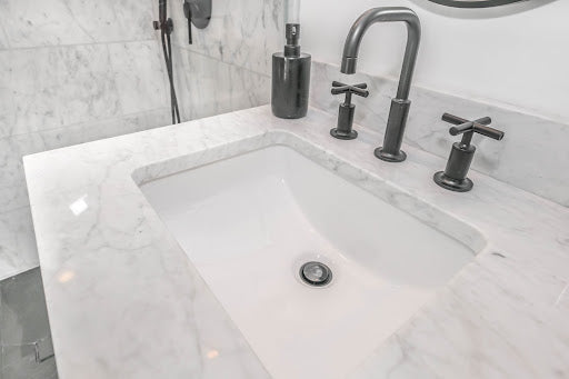 white marble bathroom sink